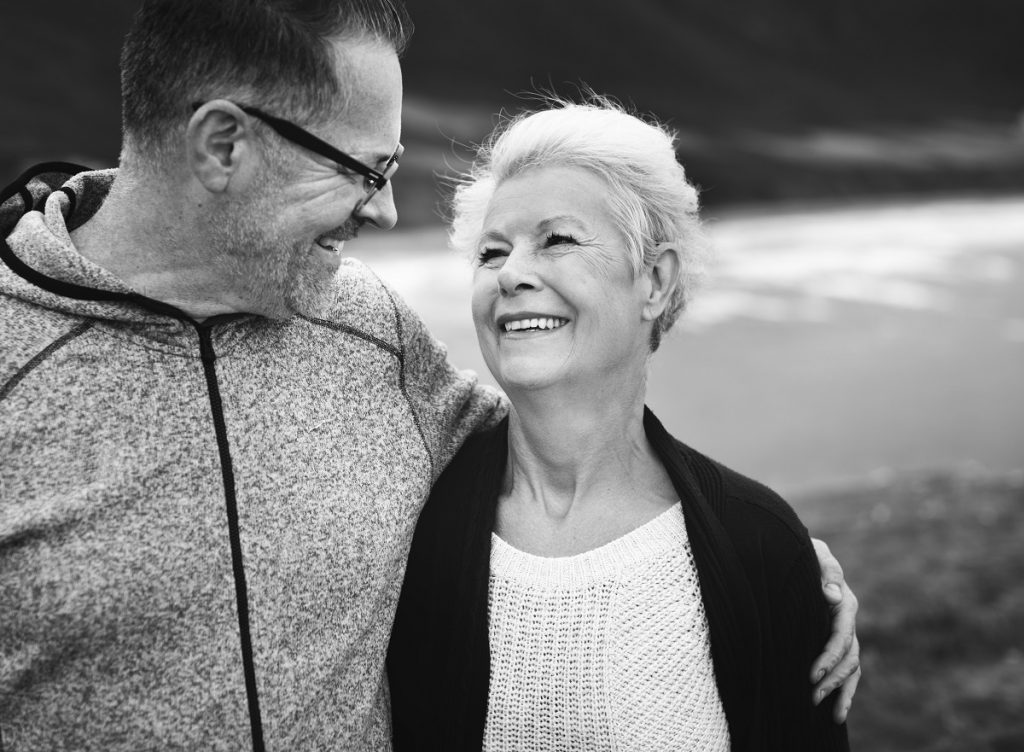 Older couple looking happy with no age spots